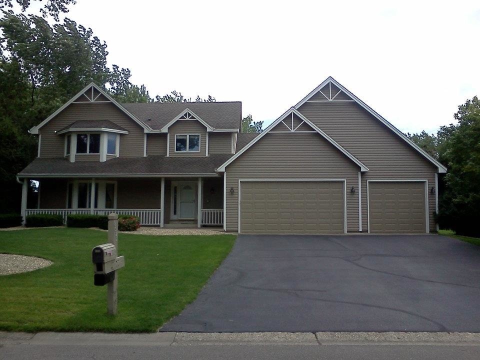 A home with new siding and a new roof.